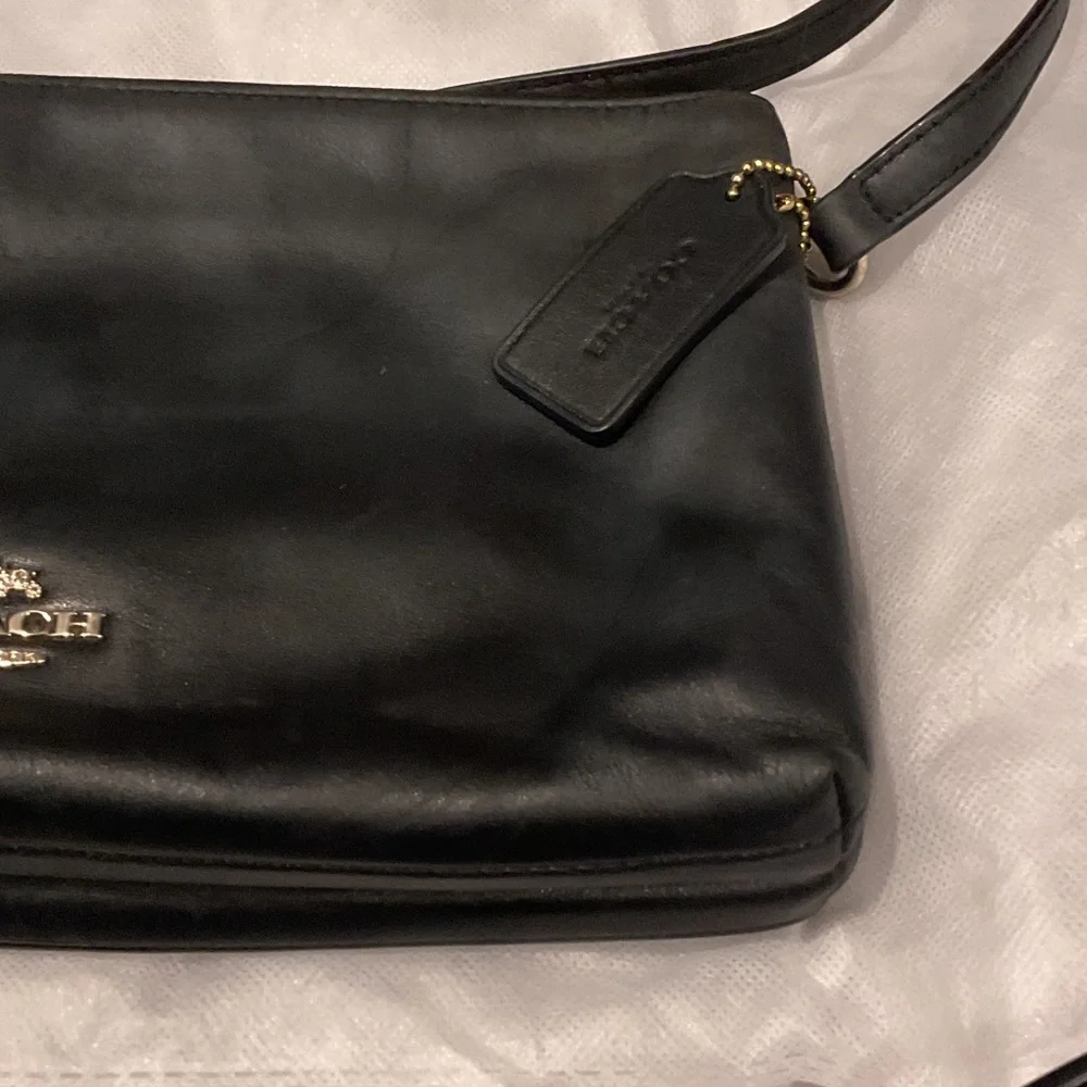 Coach Black Leather Crossbody Bag with Gold Accents